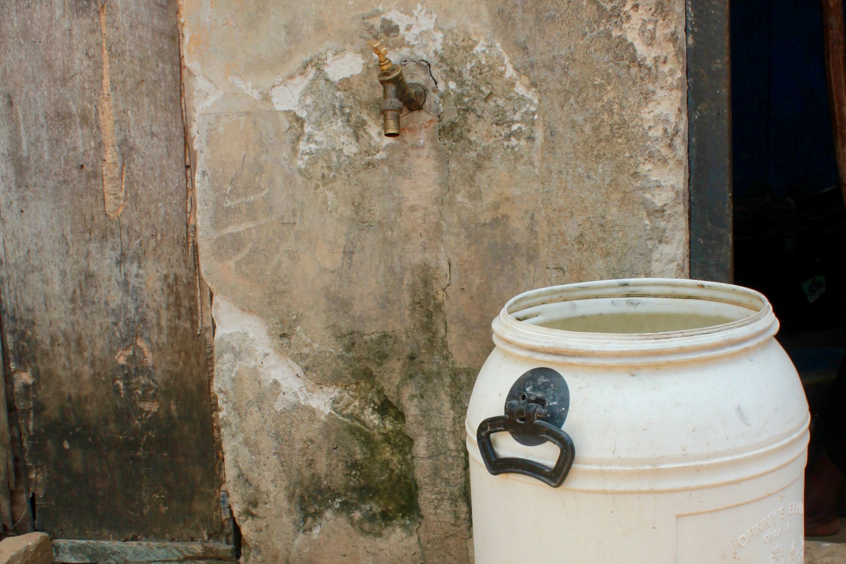 Water is a key ingredient for a fufu seller in a village in Shama District, Western Region, Ghana.