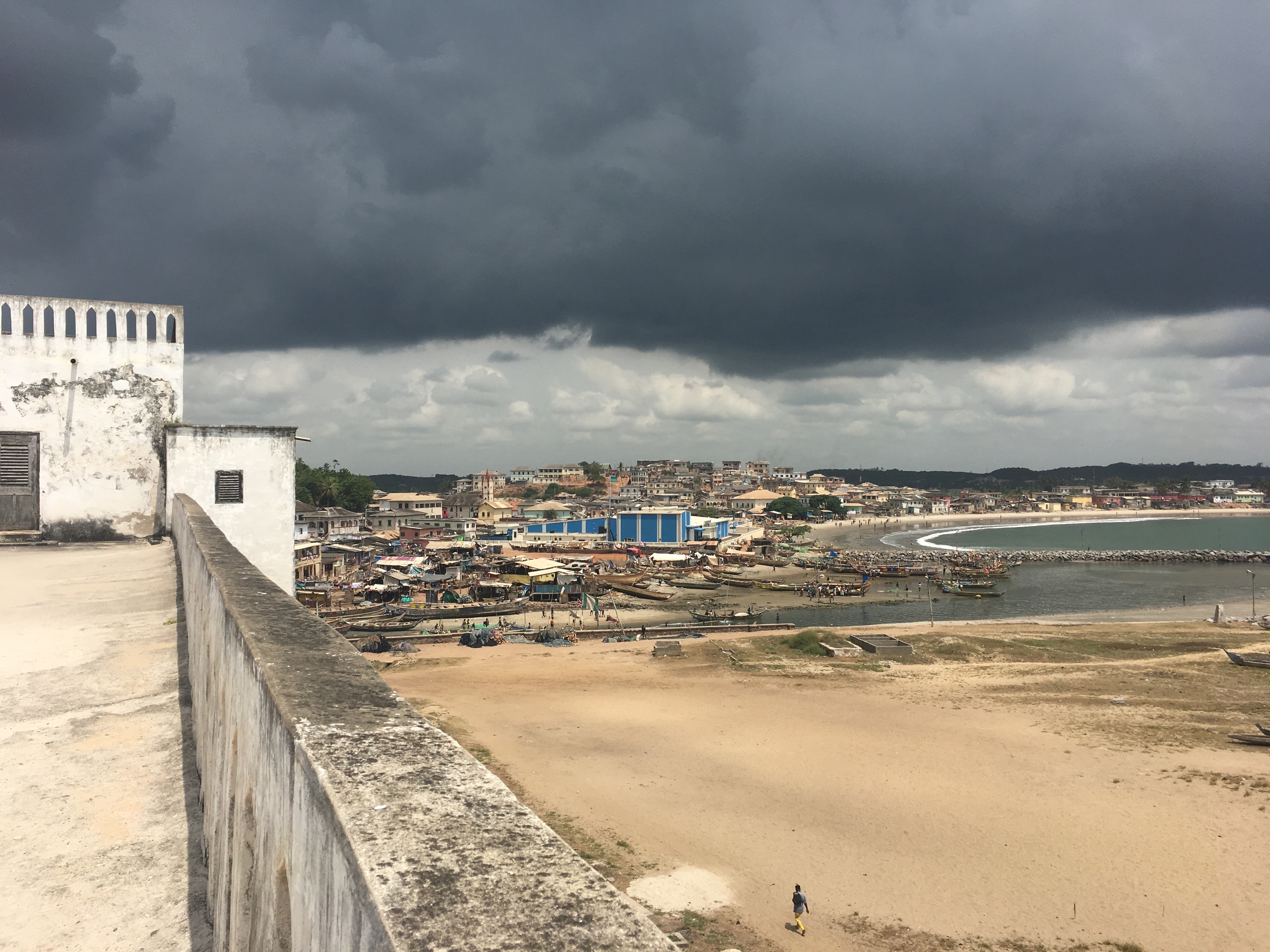 View of the town from Elmina Castle. Slave ships used to dock on the sandy shore to carry people to the Americas.